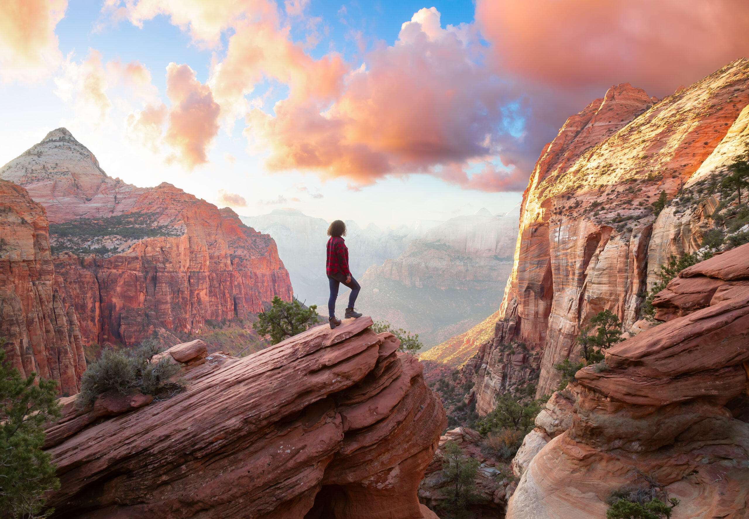 Woman overlooking Grand Landscape at Zion National Park Utah